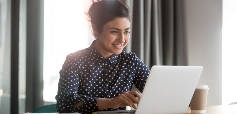 woman-with-laptop-830x400